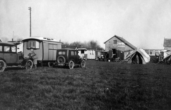 Voyageur caravan with Austin Seven on campsite  early 1930's. Creator: Unknown.