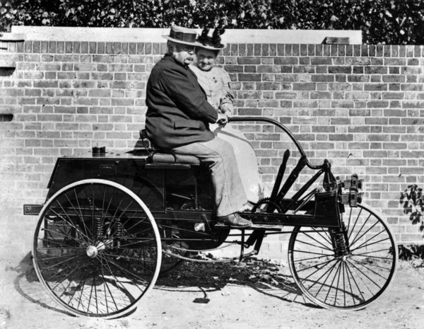 John Henry Knight and wife on Knight 1895 3 wheeler. Creator: Unknown.