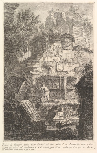 Ruins of an ancient tomb in front of ruins of an ancient aqueduct