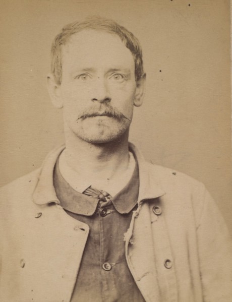 Ravinet. Gaston. 34 ans, né à Paris XIXe. Couvreur. Anarchiste. 1/3/94., 1894.