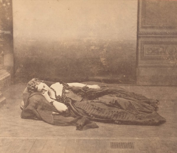 [La Comtesse Reclining in Dark Dress with Chain Around Neck], 1861-65.