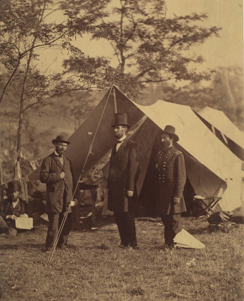 [President Abraham Lincoln, Major General John A. McClernand (right), and E. J. Allen (Allan Pinkerton, left), Chief of the Secret Service of the United States, at Secret Service Department, Headquart...