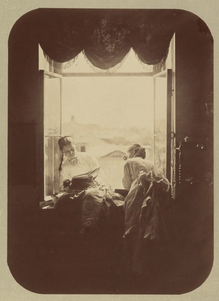 [Two Young Women at Window], ca. 1870.