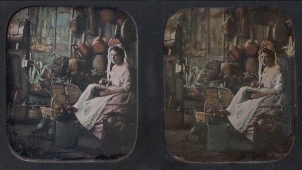 [Woman in Apron and Bonnet Grinding Coffee in Kitchen Setting], 1850s.