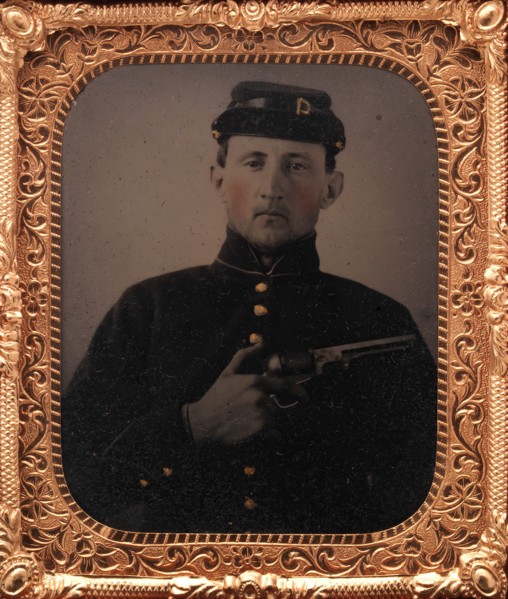Union Soldier with Colt Revolver, in Studio, 1861-65.