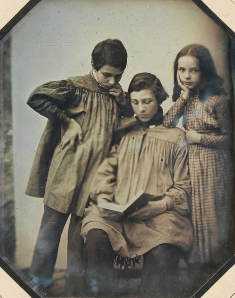 [Three Children, One Seated Holding an Open Book, the Other Two Standing, in Front of a Light Background], ca. 1845.