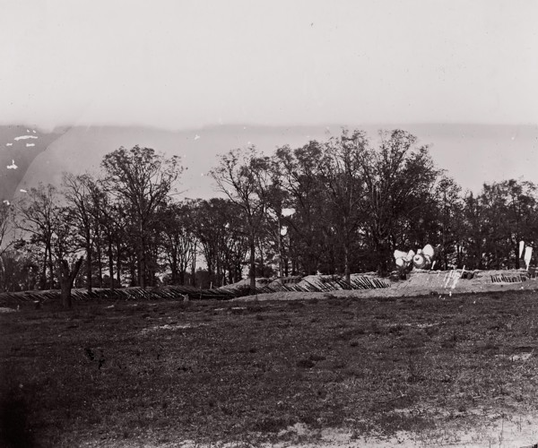 [Earthworks at the edge of a forest]. Brady album, p. 132, 1861-65. Formerly attributed to Mathew B. Brady.