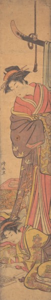 Young Woman Looking over Shoulder of Another who is Writing a Letter.