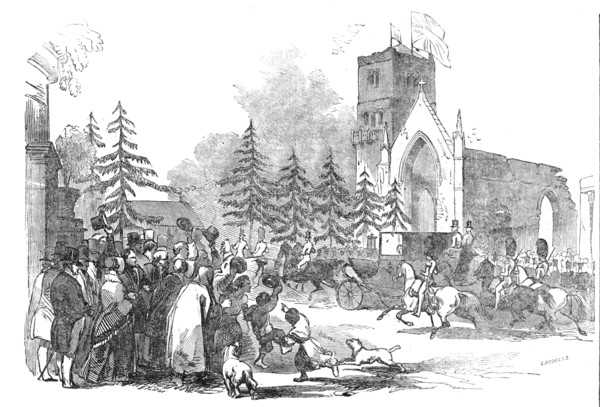 The Royal Party passing the triumphal arch