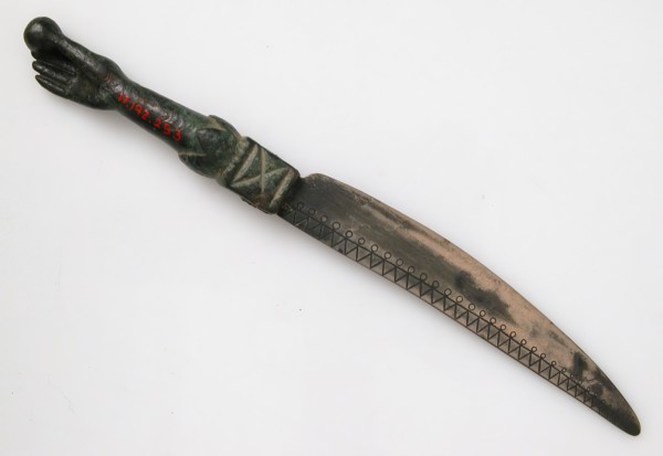 Knife with a Hand Holding an Orb