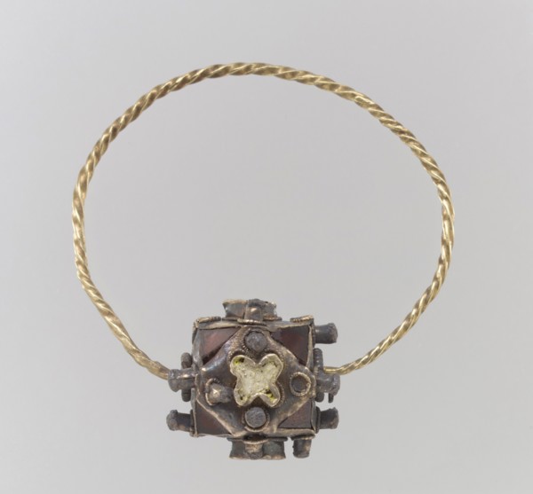 One of a Pair of Gold Earrings with Garnets, Frankish, second half 8th century.