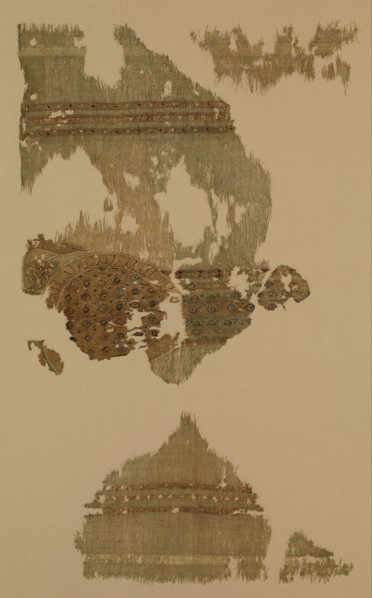 Portion of a Garment with Geometric Patterns