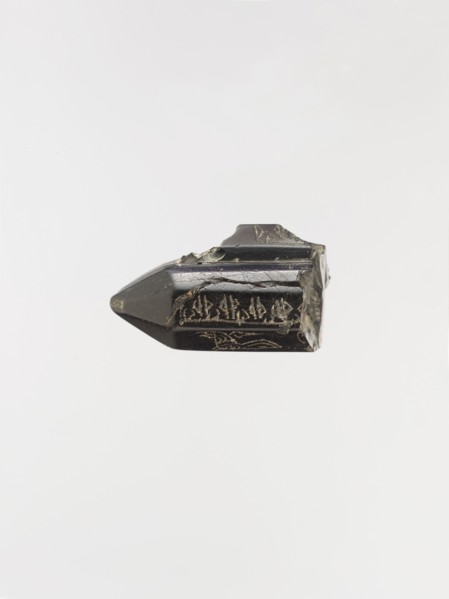 Cylindrical Pendant with Magical Writing, Iran, 9th-10th century. The inscription remains undeciphered and may be a magical alphabet.
