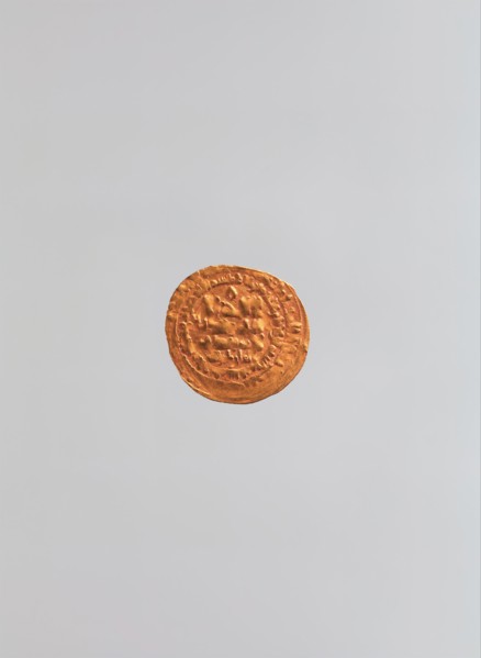 Dinar of Tughril (r. 1040-63), Iran, dated A.H. 444/ A.D. 1052-53. Inscription naming reigning Seljuq sultan, Tughrul Beg with Qur?an verses 33:9 and 9:61