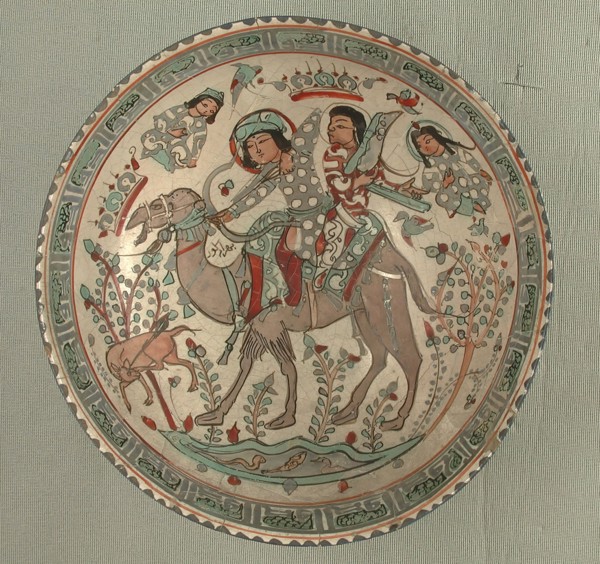 Bowl, Iran, 12th-13th century. Bahram Gur, riding a camel with one of his slaves, Azadeh playing a harp.