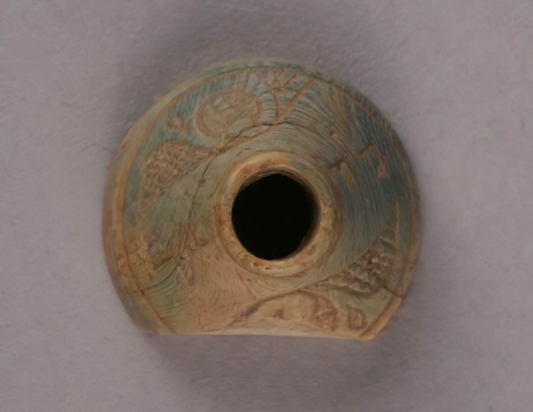 Spindle Whorl, Iran, 9th-10th century.  Excavated at Nishapur, providing evidence the city possessed a thriving textile industry.
