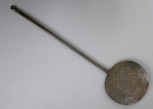 Long-Handled Spoon Inscribed in Arabic with Good Wishes, Iran, 11th century. Kufic inscription