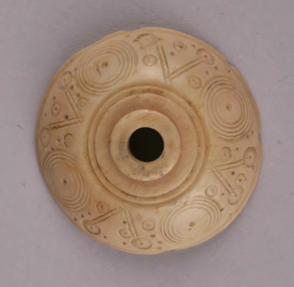 Spindle Whorl, Iran, 9th-10th century.  Excavated at Nishapur, providing evidence the city possessed a thriving textile industry