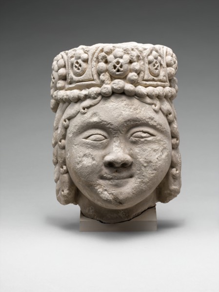Head from a Figure with a Beaded Headdress, Iran, 12th-early 13th century. rare example from the Seljuq period.