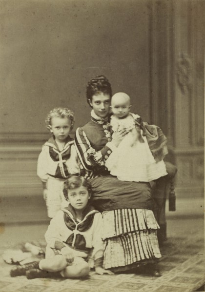 Grand Duchess Maria Fyodorovna with children, Nicholas Alexandrovich, George Alexandrovich and Xenia Alexandrovna, c. 1875. Private Collection.