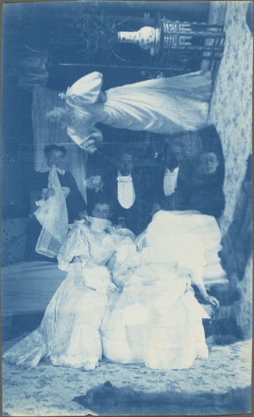 Untitled (Double exposure of several people in interior), 1890s.
