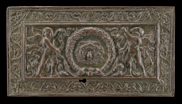 Cover of a writing casket: Geniuses with Wreath and Medusa Head, c. 1500.