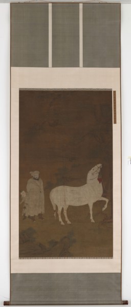 Central Asian groom pasturing a horse, 14th century.