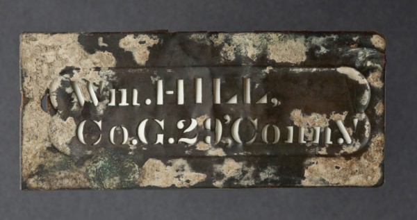 Metal plate with raised edge and cut out letters “Wm.HILL,/ Co.G.29,' Conn.V”