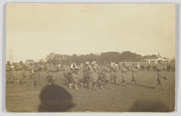 Photographic postcard of a military marching band, ca. 1917. Creator: Unknown.