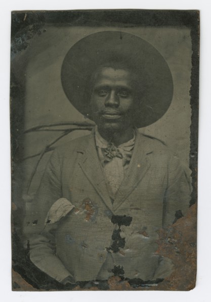 Tintype portrait of a man wearing a hat and suit, late 19th century. Creator: Unknown.