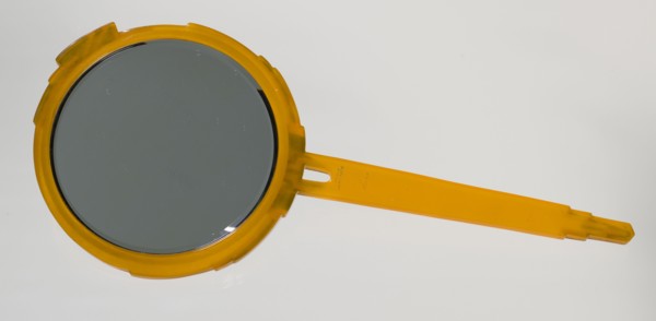 Bakelite hand mirror from dresser set owned by Lena Horne, mid 20th Century. Creator: Agalin.