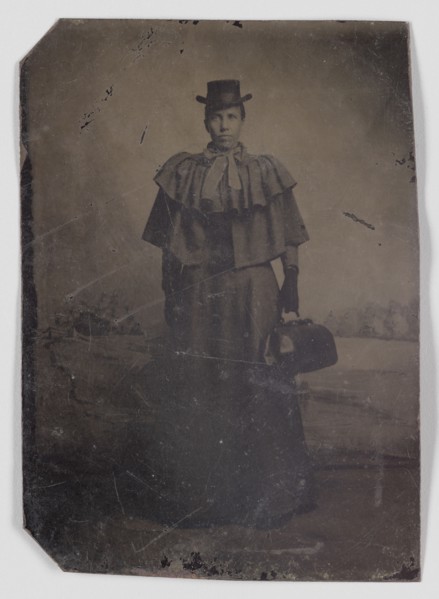 Tintype of a woman carrying a medical bag,1890s. Creator: Unknown.