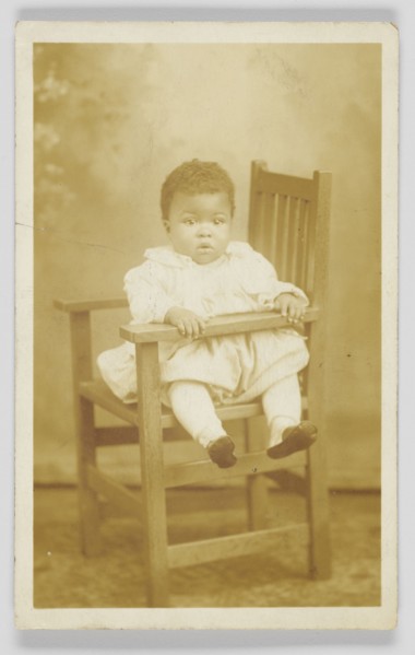 Photographic postcard of unidentified child, 1917-1930. Creator: Unknown.