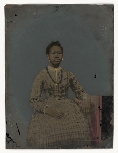 Tintype of a seated young woman, 1850-1875. Creator: Unknown.