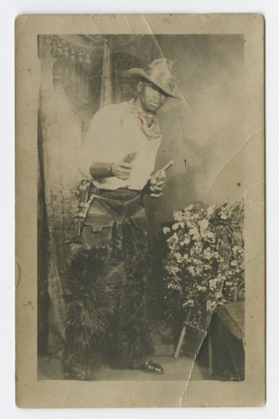 Photograph portrait of a man dressed as a cowboy, early 20th century. Creator: Unknown.