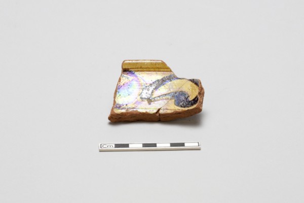 sherd, red body, white slip, yellow glaze with brown stain, Mamluk period, 1250-1516. Creator: Unknown.