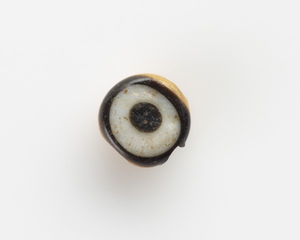 Eye-bead, with a lateral bore; the eyelet broken off, New Kingdom, 1550-1307 BCE. Creator: Unknown.