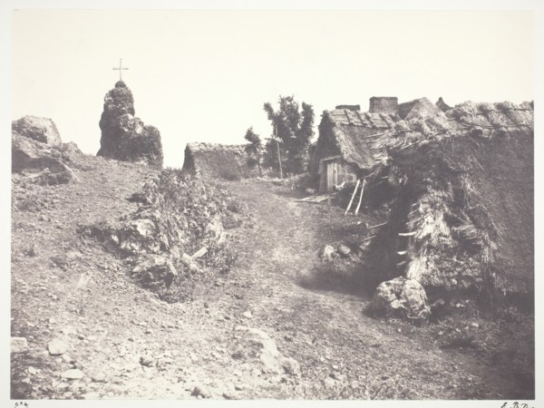 Chaumieres en Auvergne, avec un calvaire, 1852, printed 1978. Creator: Edouard Baldus.