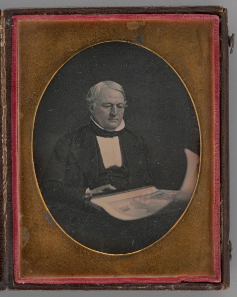 Untitled (Portrait of a Seated Man Holding a Map), 1847. Creator: Marcus Aurelius Root.