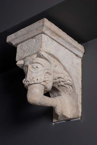 Corbel with Animal Mask with Teeth Fastened on Human Leg from the Monastery Church of... Creator: Unknown.