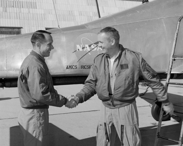 Fred Drinkwater congratulating Neil Armstrong, California, USA, February 1964.  Creator: Lee Jones.