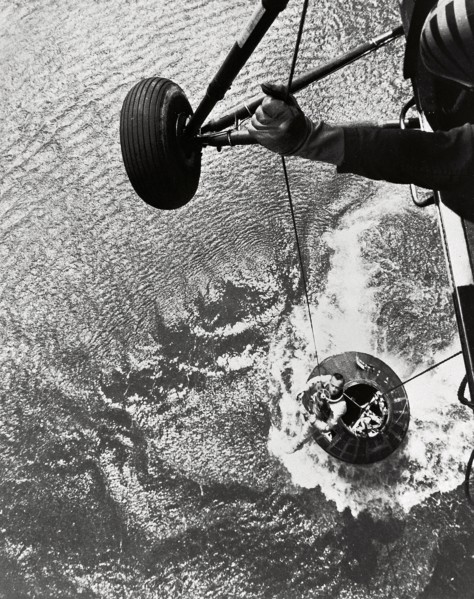 Shepard hoisted from Mercury capsule, 1961.  Creator: NASA.