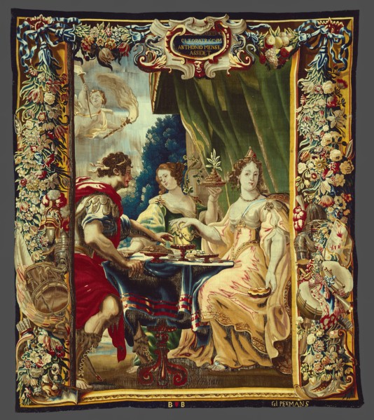 Cleopatra and Antony Enjoying Supper, from The Story of Caesar and Cleopatra, Brussels, c. 1680. Cleopatra dissolves a pearl in a cup of vinegar. Woven at the workshop of Gerard Peemans, after a desig...