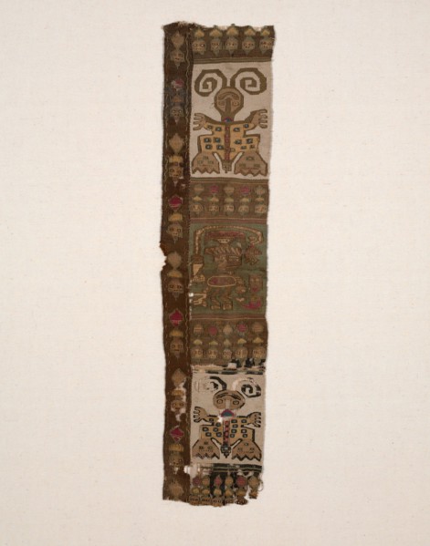 Fragment, Peru, A.D. 1000/1476. Bird-headed anthropomorphic figure holding a ceremonial knife (tumi), performing human sacrifice. The amphibian-butterflies may allude to metamorphosis or hallucinogens...