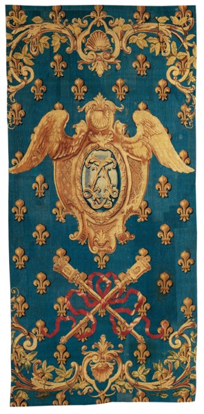 Chancellerie, France, 1718/21. Winged crest and crossed maces on a ground of fleurs de lis. Woven at the Manufacture Royale des Gobelins.