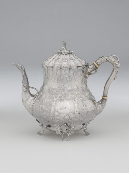 Hot Water Pot, 1850. Floral decoration with 'Almy' inscribed between repoussé trees.