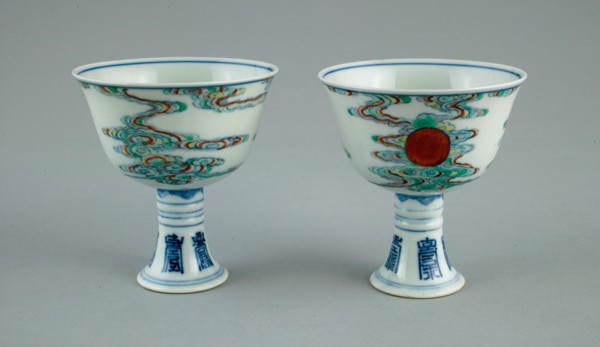 Pair of Stem Cups with Sun amid Clouds and Stylized Characters for 'Long Life' (Shou), Qing dynasty (1644-1911), Yongzheng reign mark and period (1723-1735).