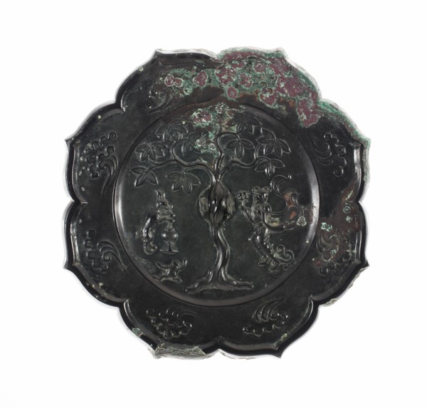 Lobed Mirror with Images of the Moon Palace Hare Pounding Elixir, Toad, and Chang E Holding Peaches of Immortality, Tang dynasty (A.D. 618-907), 8th century.