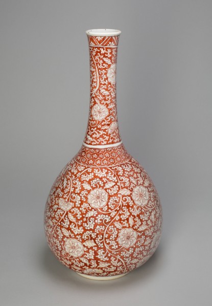 Large Export Copper-Red 'Floral' Bottle Vase, Qing dynasty (1644-1911).