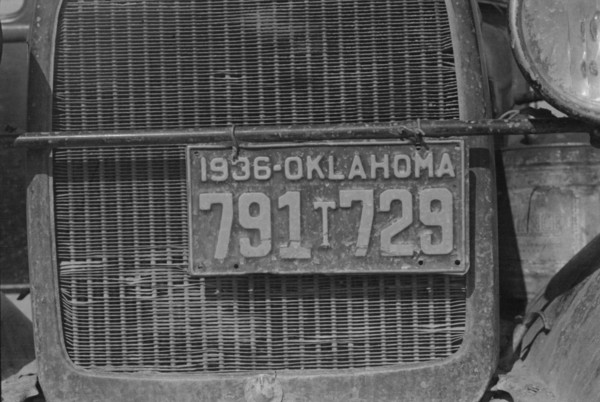 Radiator and license of Oklahoma cotton picker's car, San Joaquin Valley, California, 1936. Creator: Dorothea Lange.